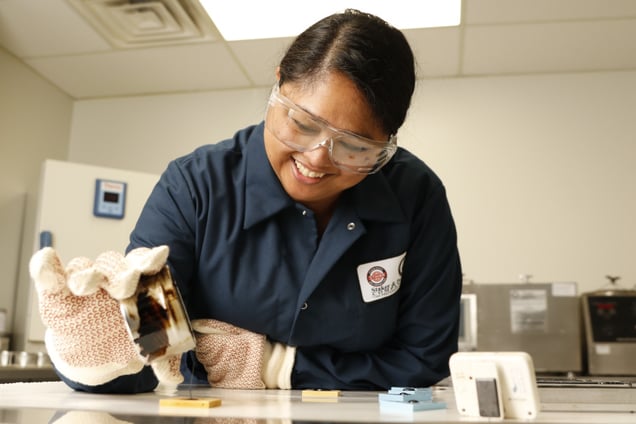female worker running quality assurance tests