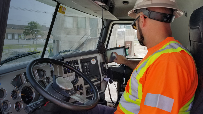 male driver using onboard computer